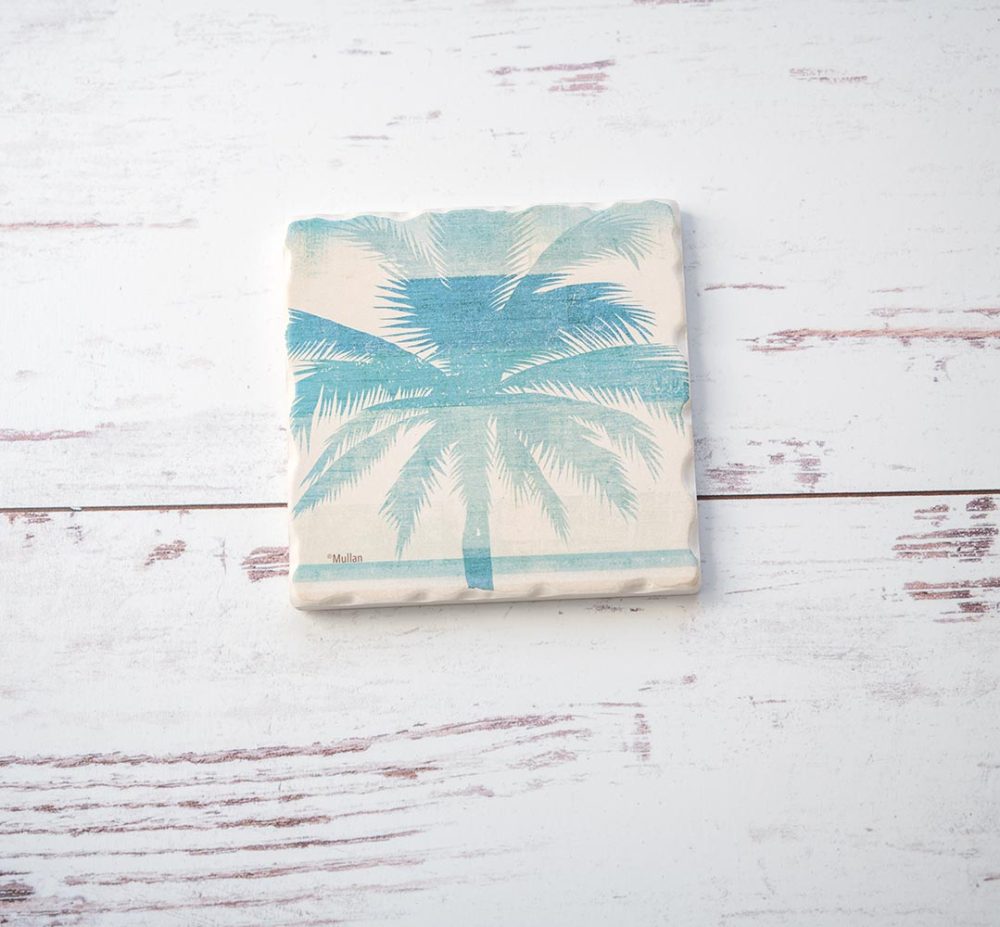 CounterArt & Highland Home Beachscapes Palm Tree coaster on a white rustic wood background