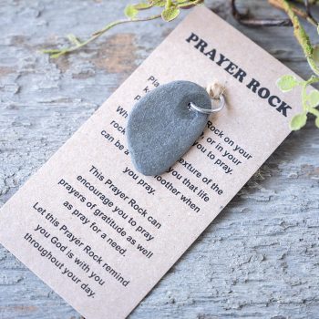 Dark Prayer Rock by Joshua Jar on a Rustic Weathered Piece of Wood