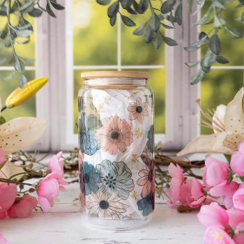 Blue Floral Glass tumbler by Emma K Designs Against a Kitchen Window Background and Pink Flowers