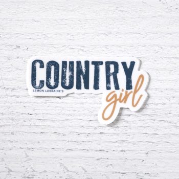 Country Girl sticker by Lemon Lorraine's on a weathered white wood background