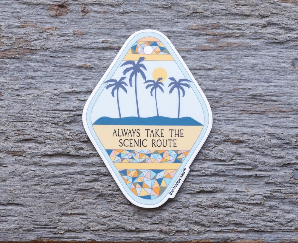 Always Take the Scenic Route Die-Cut Vinyl Sticker by the Happy Sea on a Weathered Rustic Piece of Wood