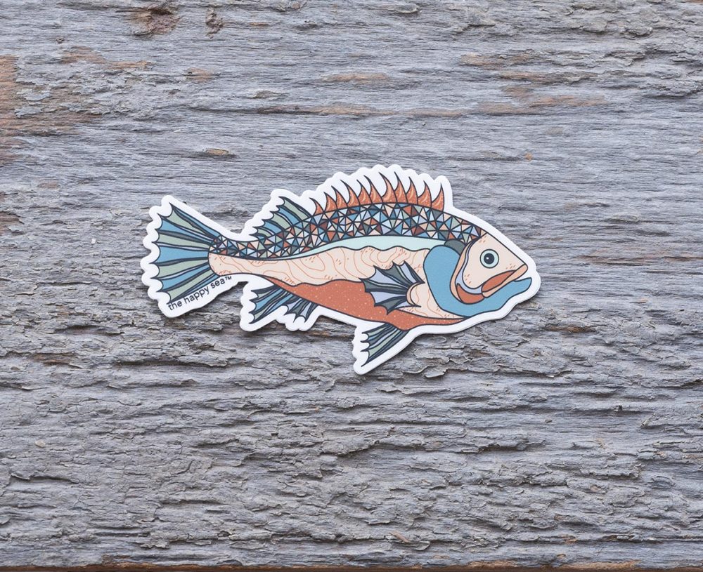 Colorful Grouper Die-Cut Vinyl Sticker by the Happy Sea on a Weathered Rustic Piece of Wood