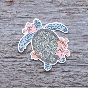 Colorful Sea Hibiscus & Sea Turtle Die-Cut Vinyl Sticker by the Happy Sea on a Weathered Rustic Piece of Wood