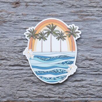 Retro Rainbow Ocean Die-Cut Vinyl Sticker by the Happy Sea on a Weathered Rustic Piece of Wood