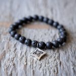 Closeup Front View of the VB&CO Designs Lava Bead Bracelet with Flower Charm
