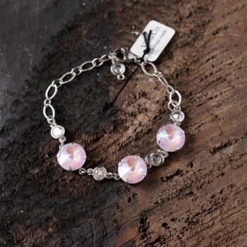 Top View of the VB&CO Designs Pink Swarovski Bracelet on a Dark Piece of Wood