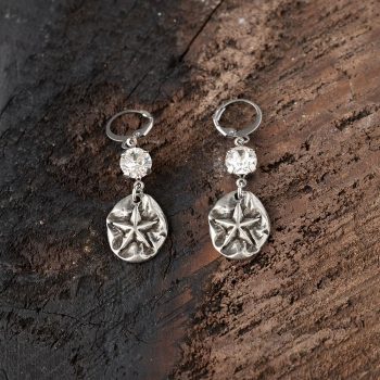 Top View of the Starfish Earrings with Swarovski Crystals by VB&CO Designs on Dark Wood