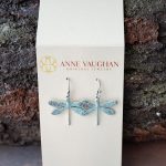 Anne Vaughn Designs Patina Dragonfly Earrings Agins a Rustic Piece of Wood