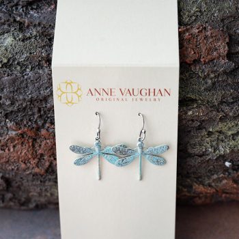 Anne Vaughn Designs Patina Dragonfly Earrings Agins a Rustic Piece of Wood