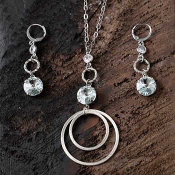 Top View of the Perfect Pairings of VB&CO Light Azure Crystal Earrings and Hoop Necklace
