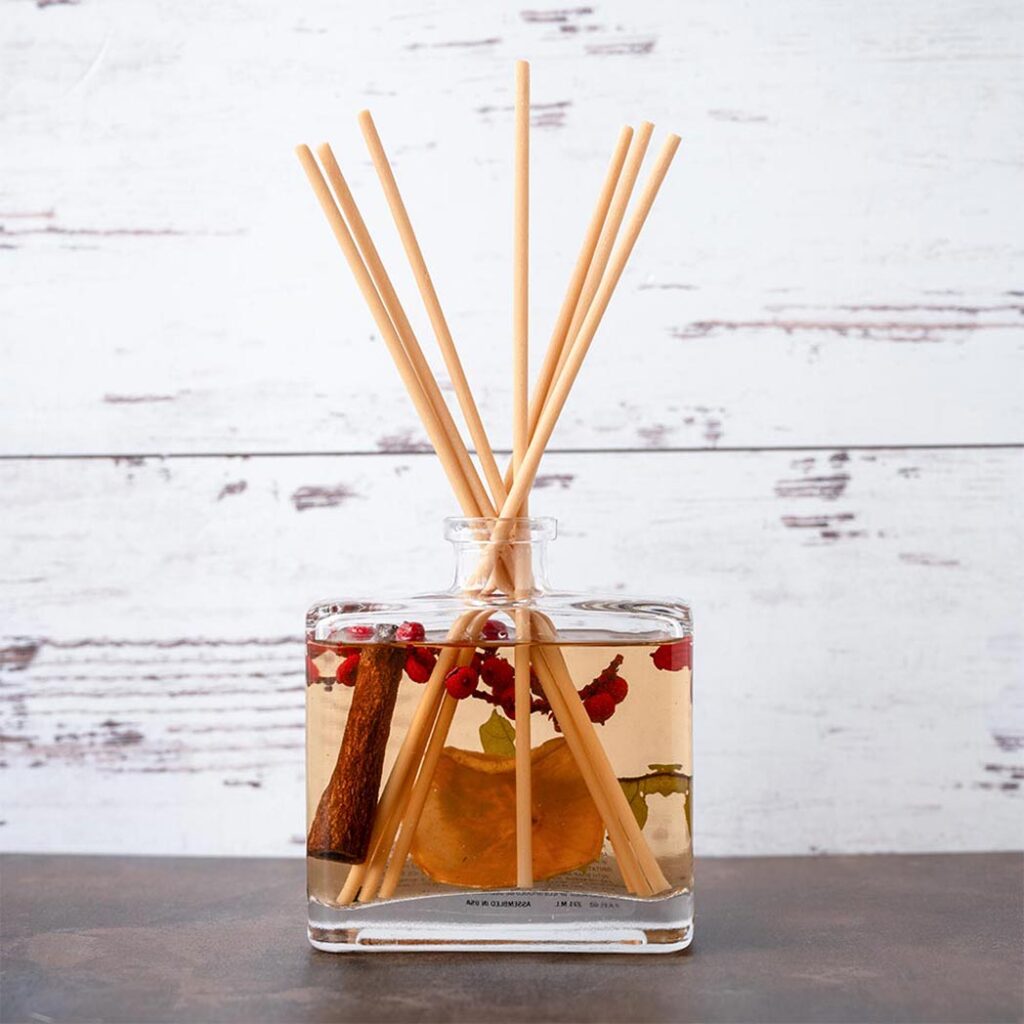 apple tobacco diffuser Rosy Rings Spicy Botanical Reed 13oz Hints of wood and vanilla round out the scent with a cozy Tobacco Apple Artisan Handcrafted Fragrance