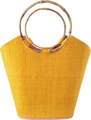 Carmen Solid Color Straw Basket against a white background
